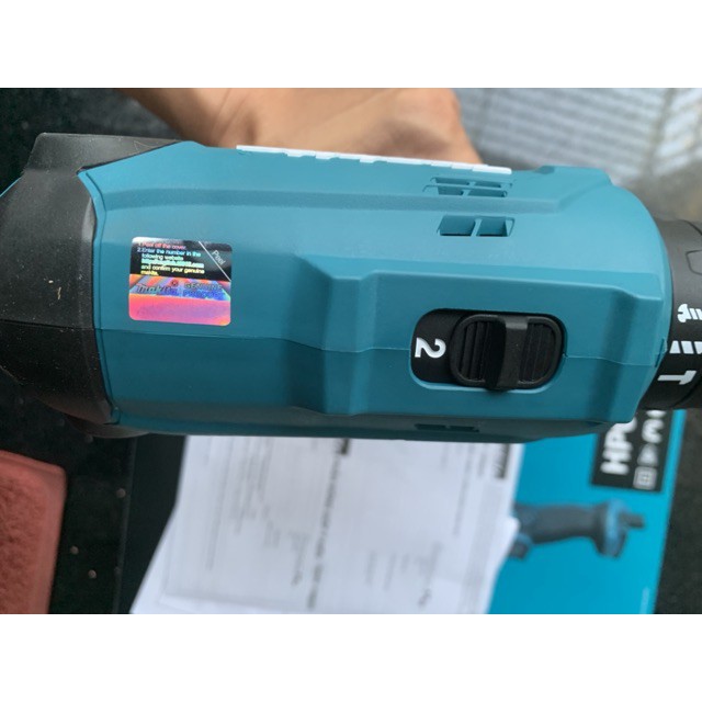 Máy khoan búa và vặn vít(10mm) Makita HP0300