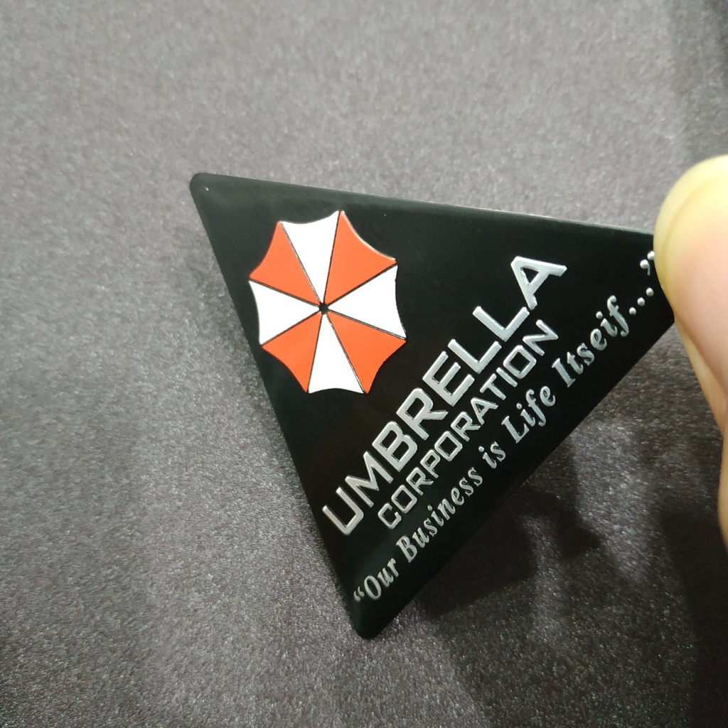 Tem nhôm Umbrella tam giác 7x7cm