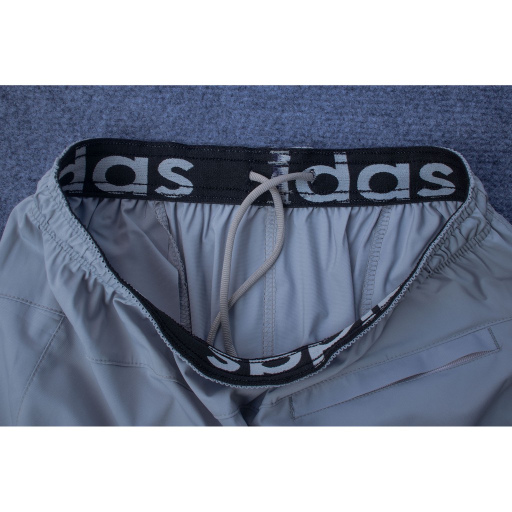 Quần short đùi thể thao nam chất gió co giãn 4 chiều không thấm nước Das 3 sọc bên sườn | BigBuy360 - bigbuy360.vn