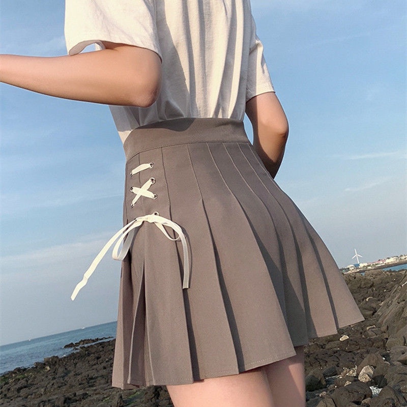 Chân váy chữ A xếp ly lưng cao có dây rút thắt nơ thời trang cho nữ