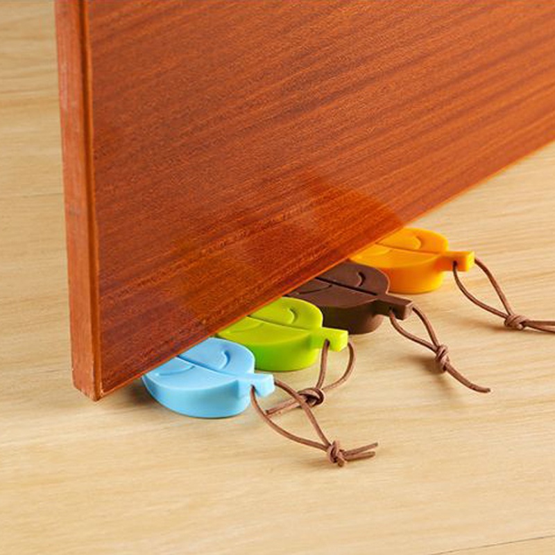 Miếng Chặn Cửa Cao Su HÌNH CHIẾC LÁ Thông Minh - Silicon Chống Va Đập Cửa Kẹp Tay Bé, Gió Lùa Sập Cửa