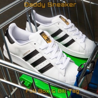 Giày sneaker sò tem vàng