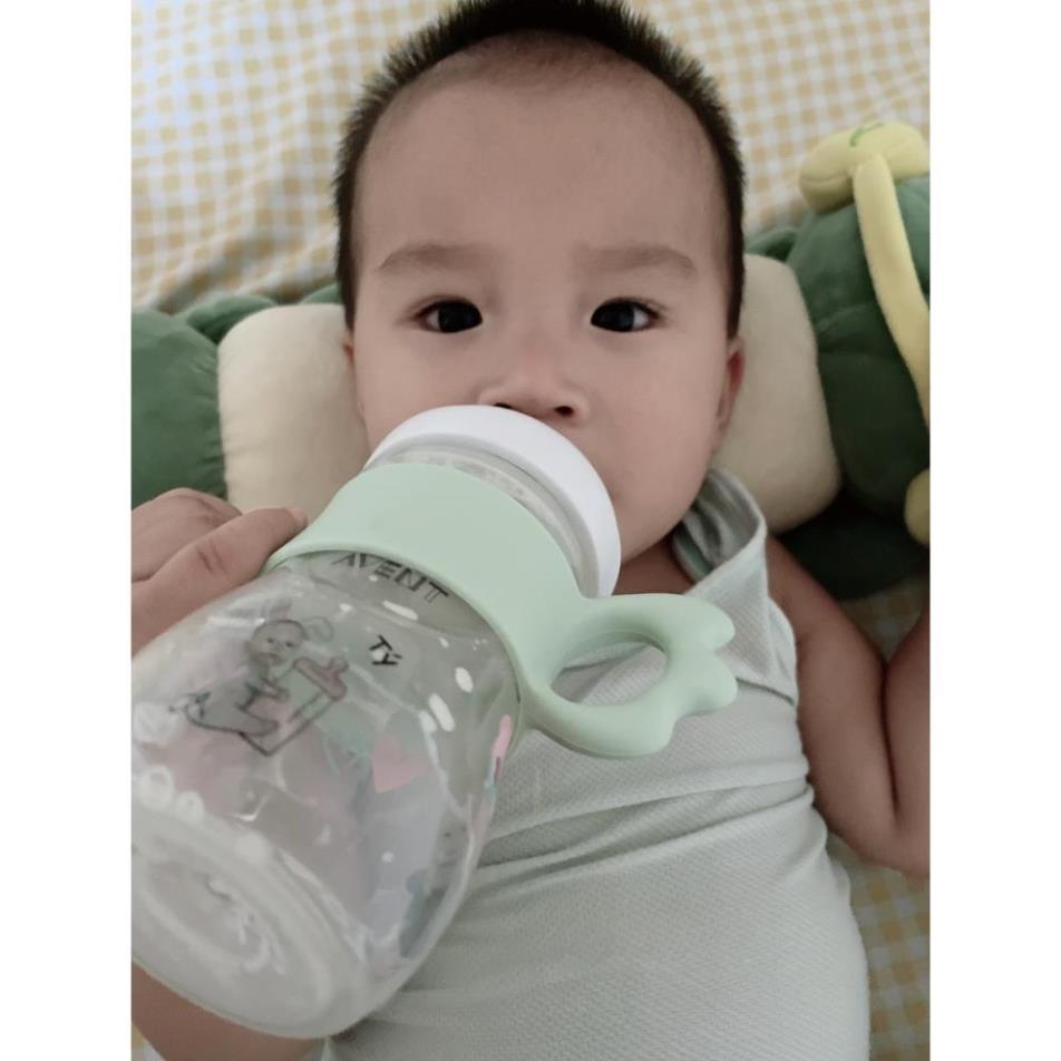 Tay cầm cánh tiên silicon cho bình Moyuum, Gross, Lansinoh, Pigeon, Avent. Tay cầm bình sữa silicon cho bình cổ rộng