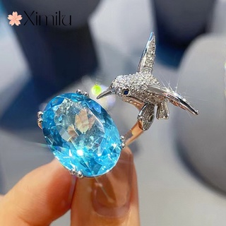 Nhẫn hở hình chim ruồi đính đá topaz xanh dương sáng tạo