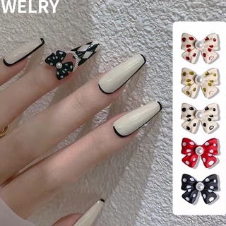 Charm nơ chấm bi trang trí móng tay