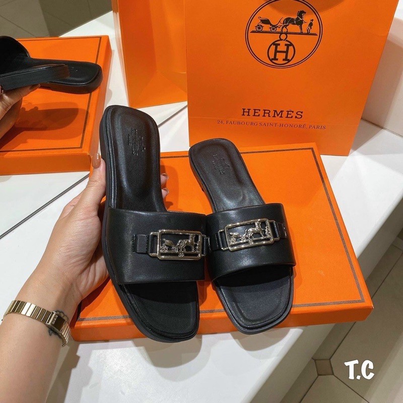 Dép lê hm khóa logo