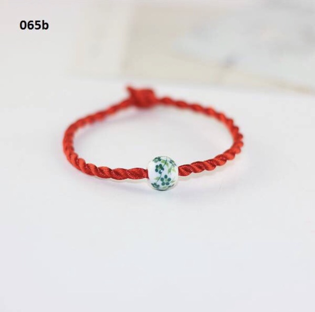 Vòng tay charm đài sen ngọc định mệnh