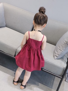 Đầm thoi 2 dây đính nơ vàng