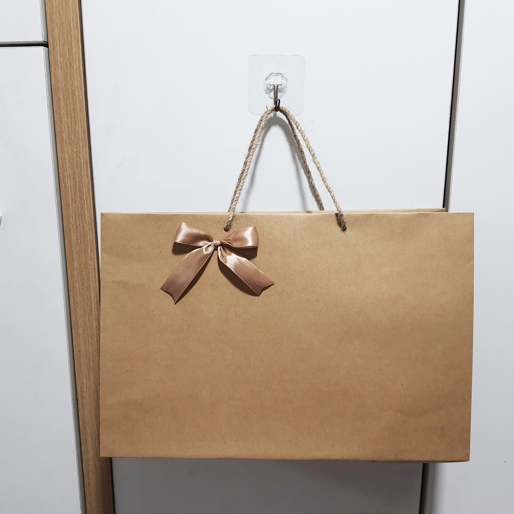 túi giấy kraft (ngang 35 cao 23.5 hông 12cm)
