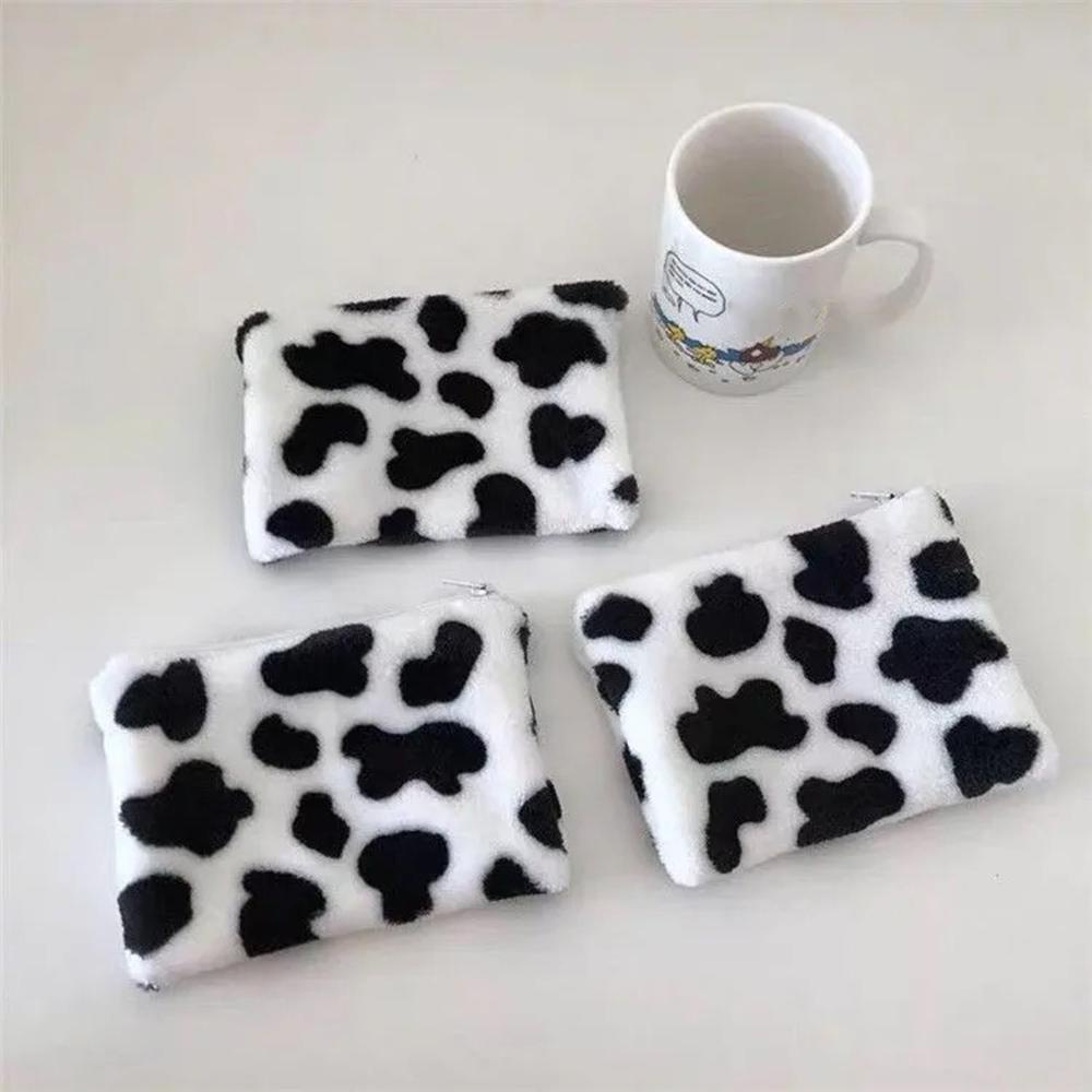 Túi đựng tai nghe mini họa tiết bò sữa dễ thương