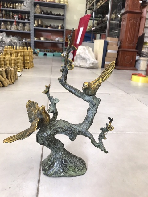 Đôi chim đậu cành mai