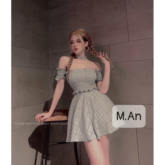 Set áo nhún thân, chân váy caro kèm choker.