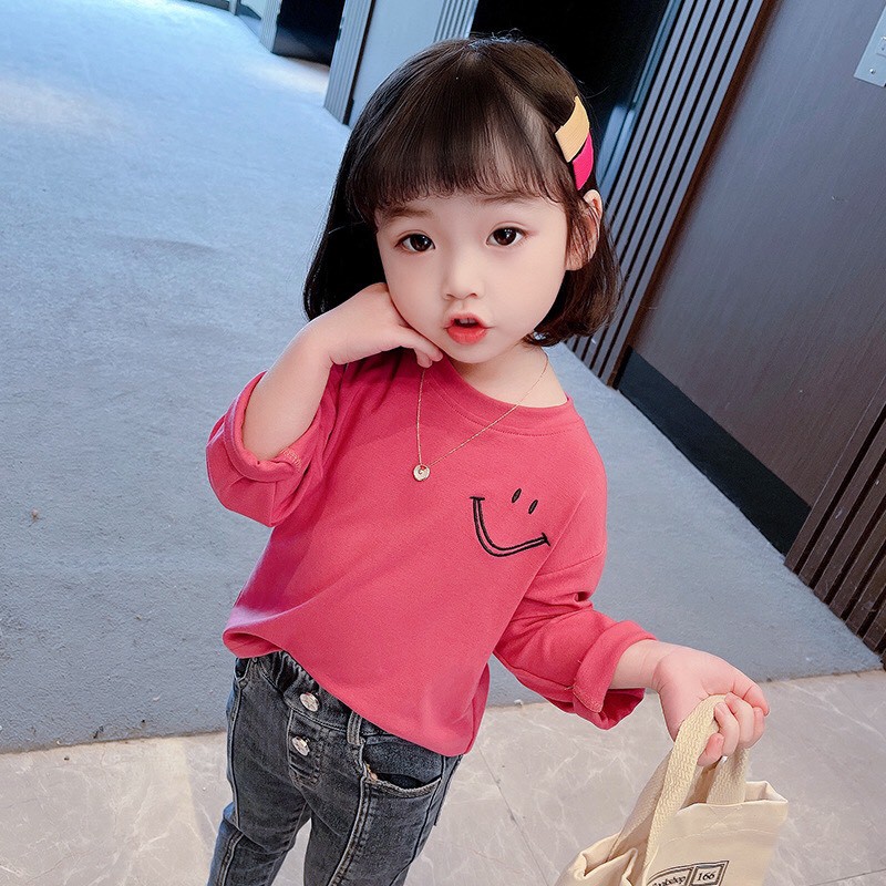Áo dời trẻ em 7-17kg dành cho bé gái hình mặt cười xinh xắn. Hàng may kỹ, chất vải đẹp, màu sắc bắt mắt