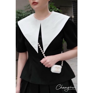 Áo sơmi cổ nhọn