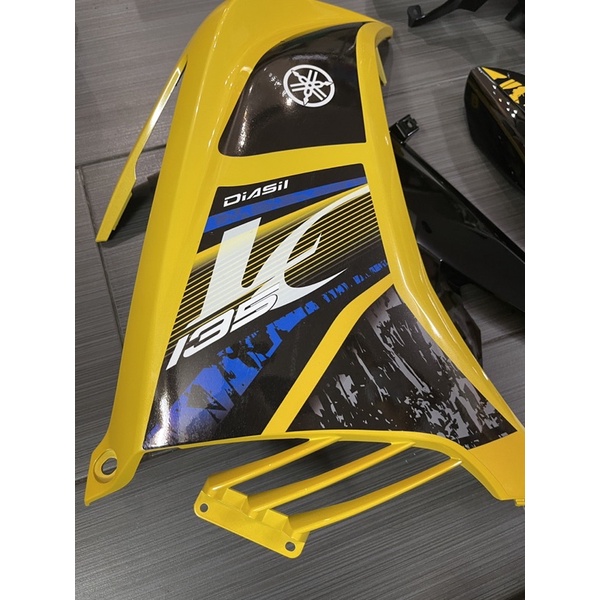 Dàn áo Ex 135 vàng đen luôn tem