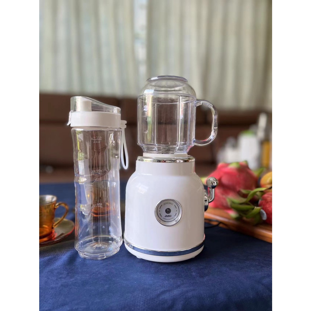 Máy xay sinh tố trái cây dáng cổ điển,tặng kèm bình dung tích 600ml,nhỏ gọn mini,công suất mạnh. Máy xay đa năng