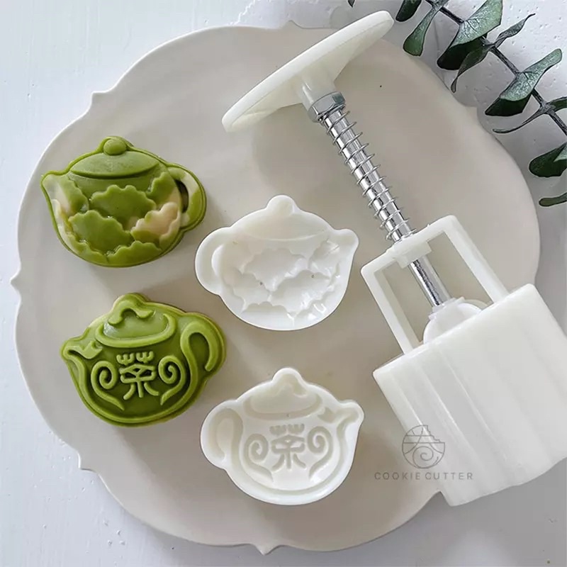 Khuôn trung thu lò xo 2 mặt cái ấm 50g