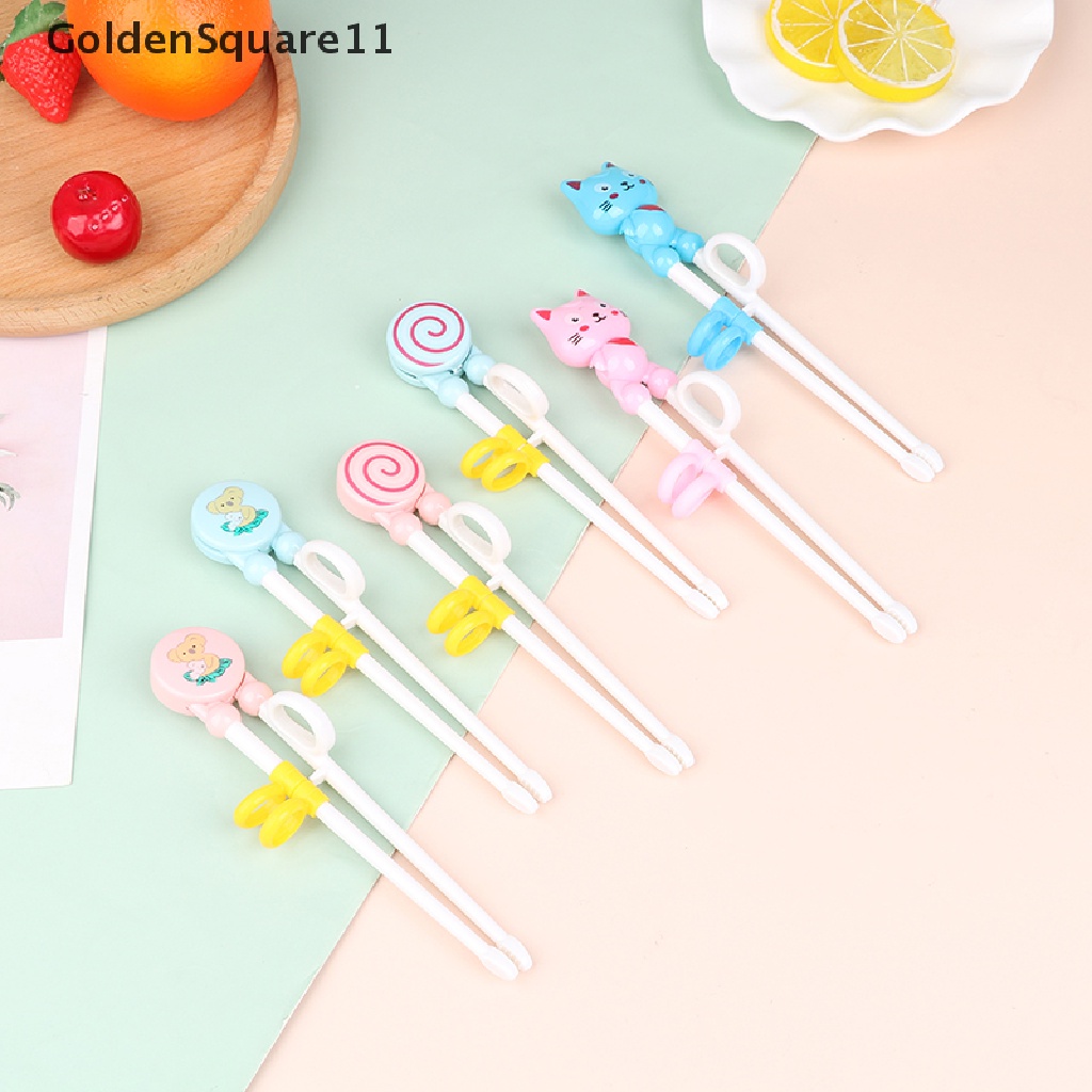 1 Đôi Đũa Nhựa Hình Hoạt Hình Cho Bé Tập Ăn GoldenSquare11