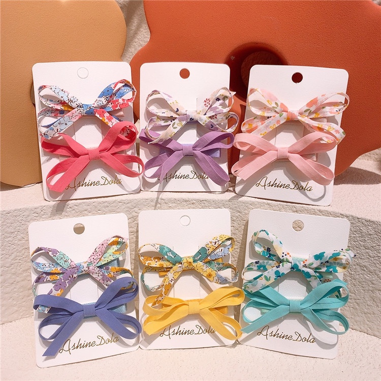 Set 2 kẹp tóc nơ màu sắc ngọt ngào phong cách Hàn Quốc cho nữ