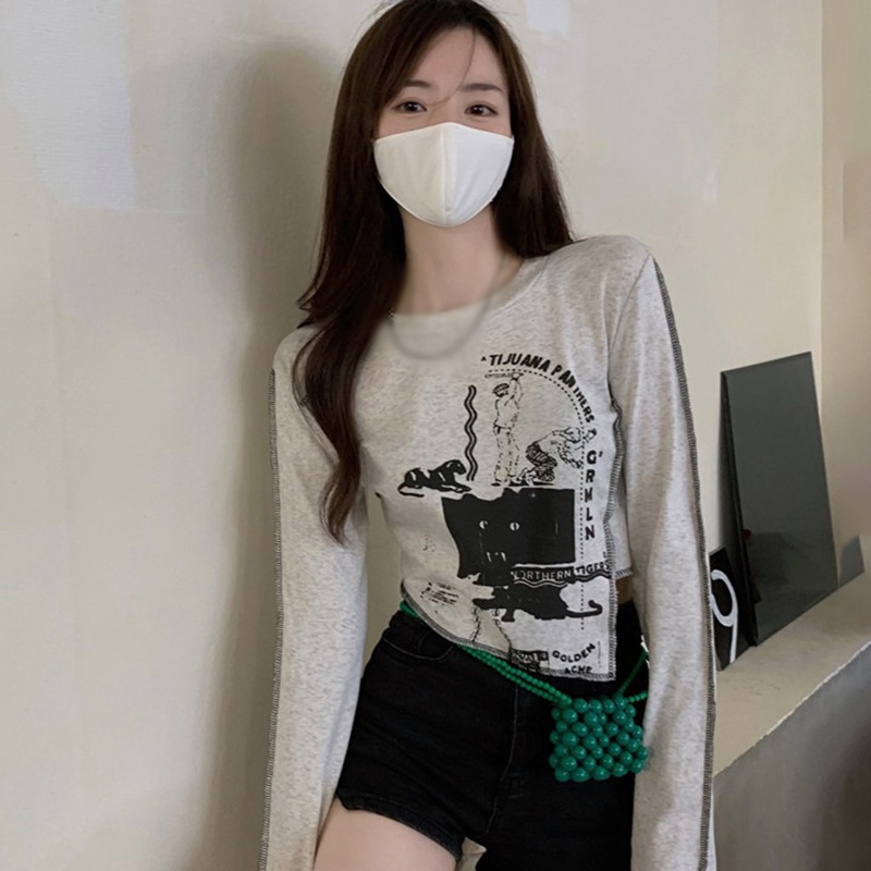 Áo Croptop Tay Dài Cổ Tròn Hoạ Tiết In Cho Phái Nữ