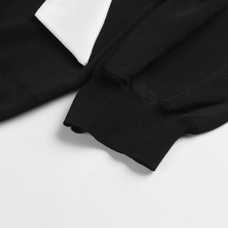 Áo len đen phối nơ trắng Peacebird