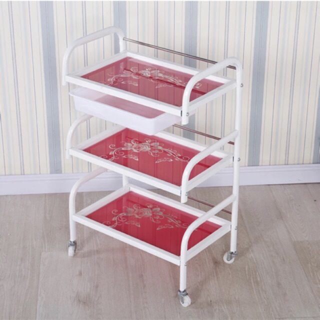 Xe đẩy dành cho các spa xe ba tầng in hoa đủ các màu hàng đẹp chắc chắn,khách có thể kiểm tra hàng trước khi thanh toán.