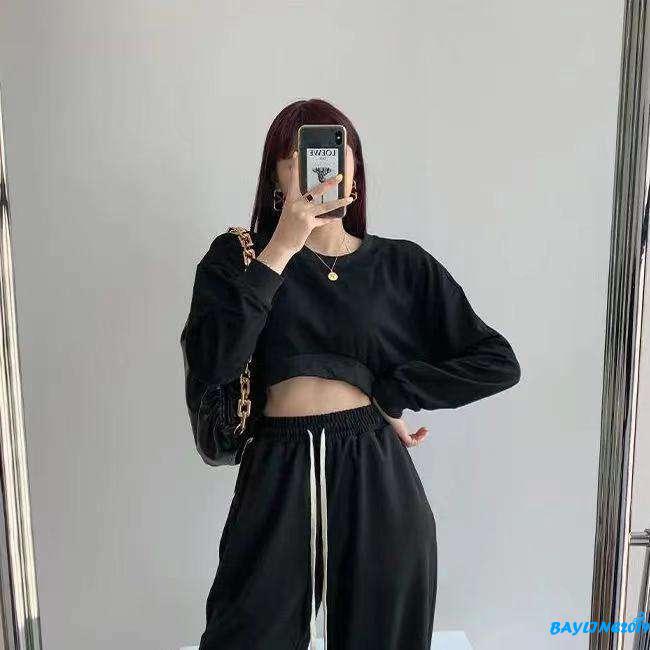 Áo thun dài tay hở rốn cổ tròn màu trơn thời trang năng động cho nữ