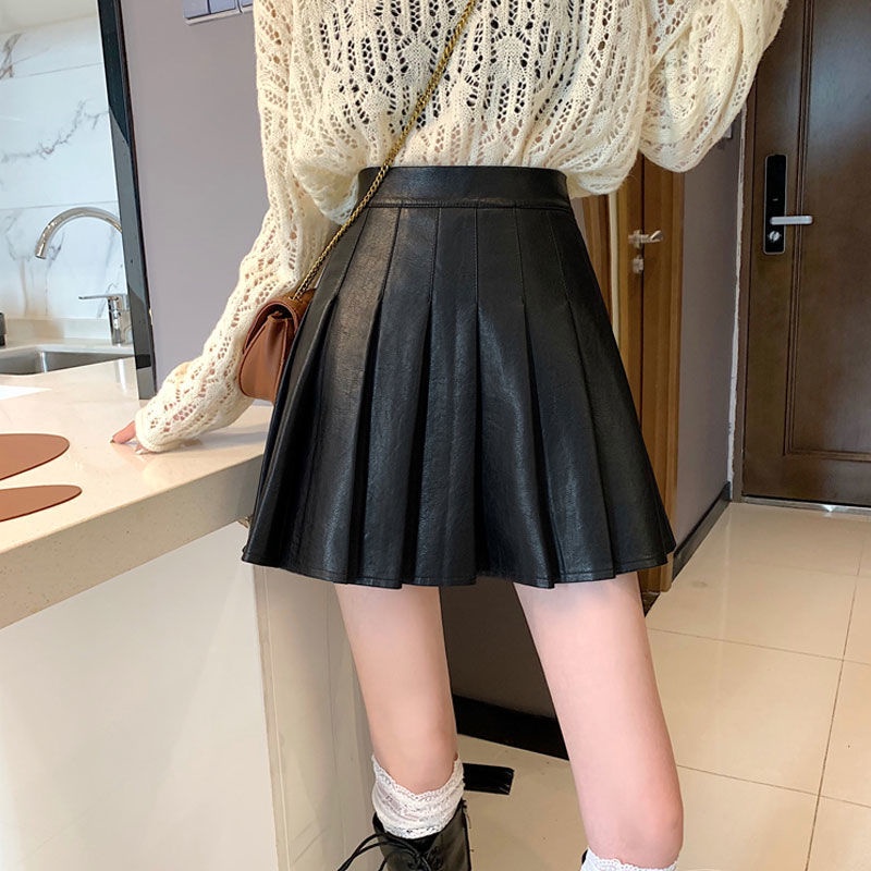 váy xếp ly nữ 2022 new pu váy ngắn giảm béo chống chói váy chữ A cạp cao váy da màu đen