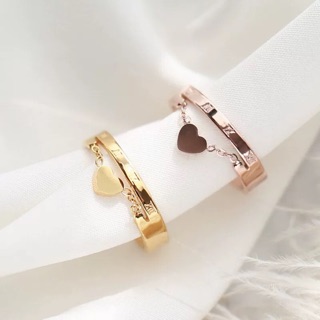 Nhẫn titan ko đEn cách điệu trái tim NT021
