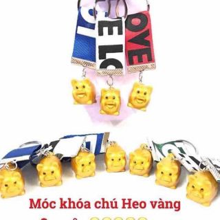 Móc khóa heo vàng dây ruyban