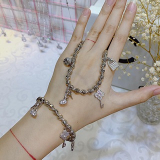 Lắc tay bi phối charm xi bạch kim