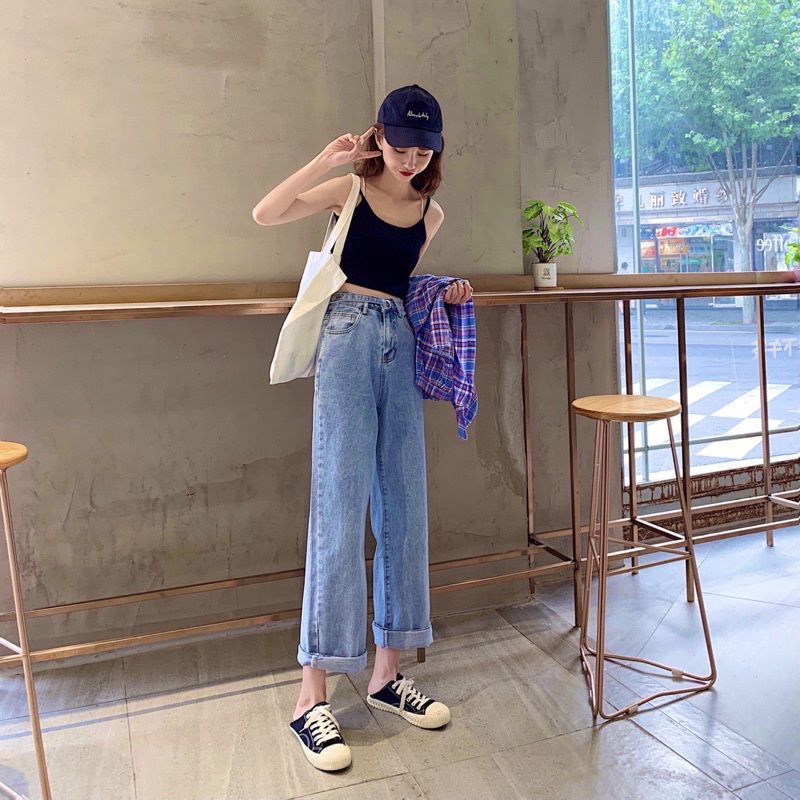 Quần jean ống rộng khuyên tròn dây khuy