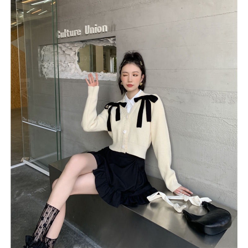 Áo khoác cardigan dệt kim cổ chữ V đính nơ phong cách mùa thu mới cho nữ