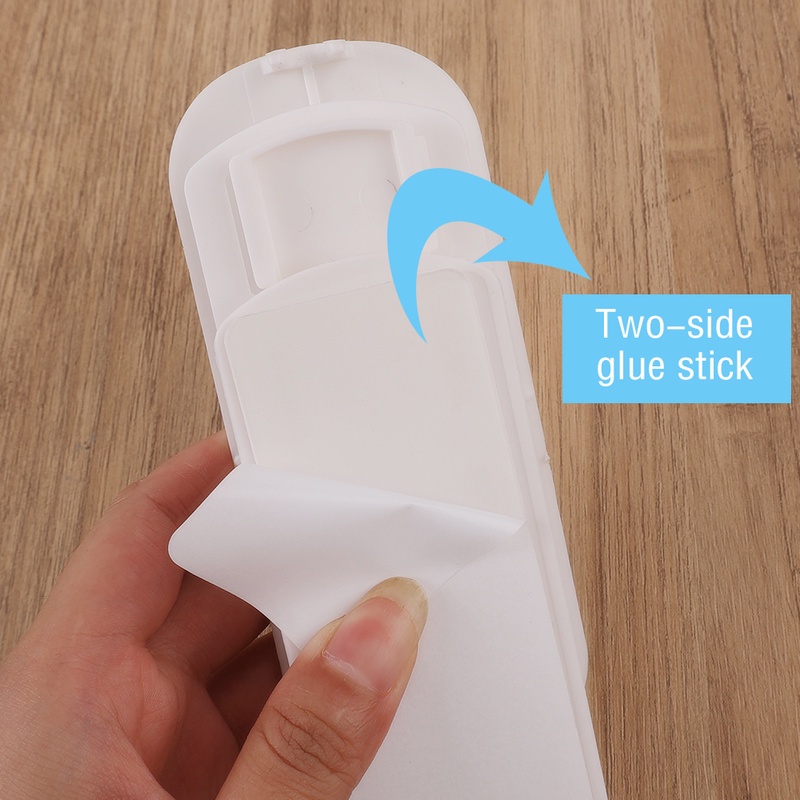 Giá đỡ ổ cắm điện dán tường tự dính sáng tạo