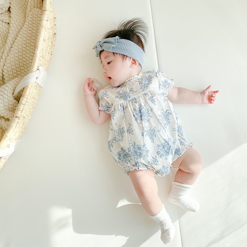 Set áo liền quần họa tiết hoa màu xanh dương + băng đô nơ cho bé gái sơ sinh