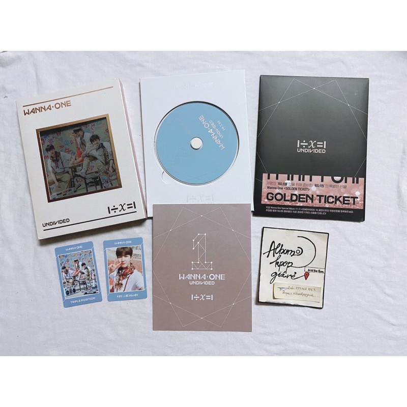 Wanna one album Undivided Triple ver đã khui seal, gồm đầy đủ đồ như hình.