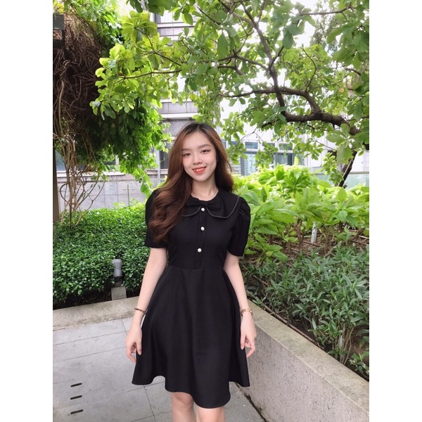 Đầm nơ viền chỉ