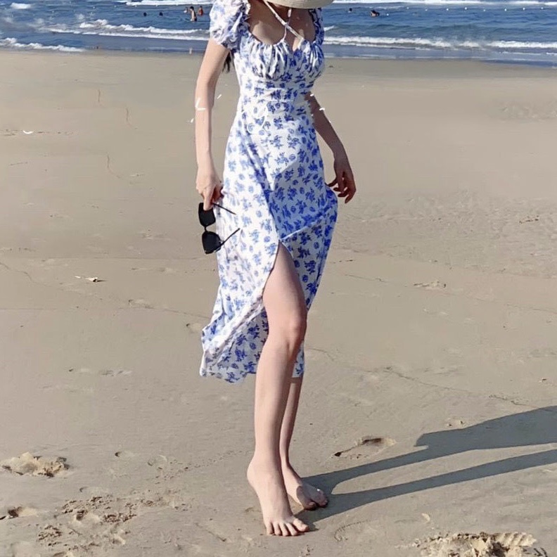 ĐẦM MIDI HOA NHÍU NGỰC XẺ ĐÙI XANH - DA2387