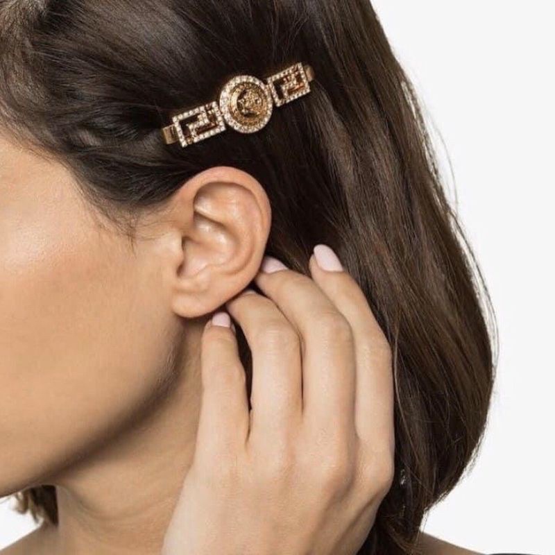 cặp tóc đính đá versace