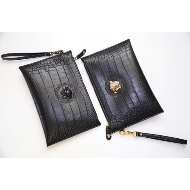 Clutch cầm tay da rắn