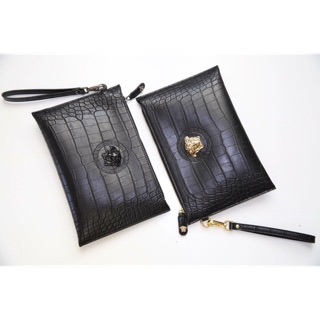 Clutch cầm tay da rắn