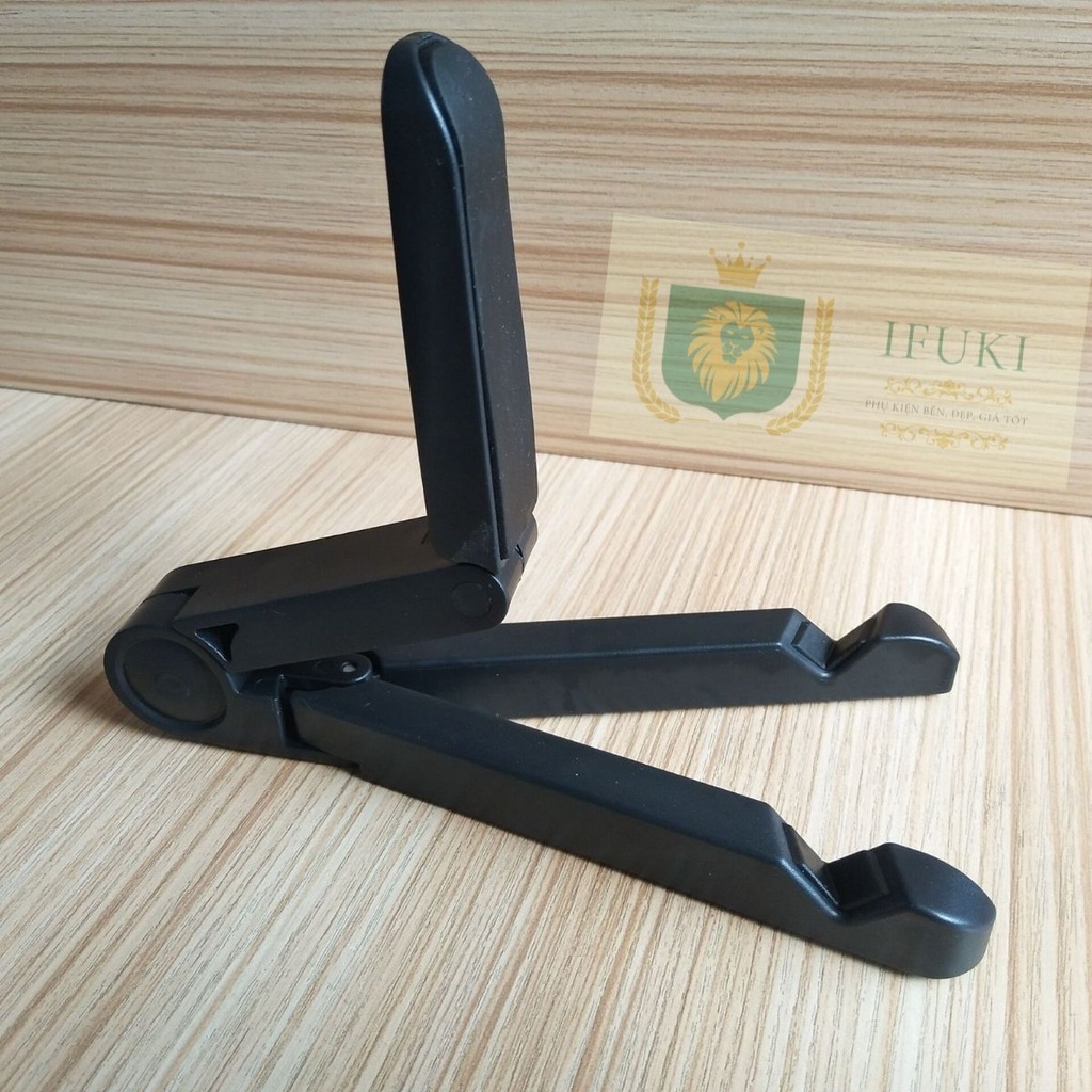 Giá đỡ đt - giá đỡ điện thoại , ipad , máy tính bảng , khung ảnh , ... Dùng để bàn hoặc trên ô tô . Gấp gọn , cầm tay