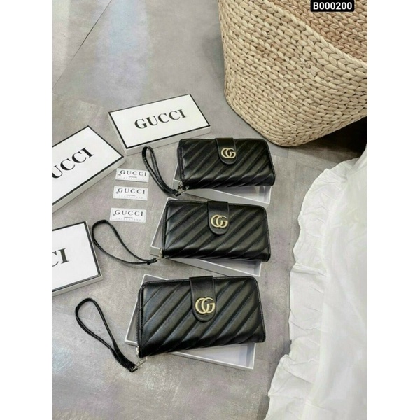 Ví cầm tay trần sọc chéo phối tag GC fullbox