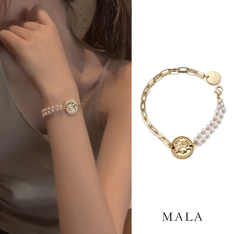 [Mã FAMAYFA giảm 10K đơn 50K] Vòng đeo tay đính ngọc trai nhân tạo thời trang dành cho nữ