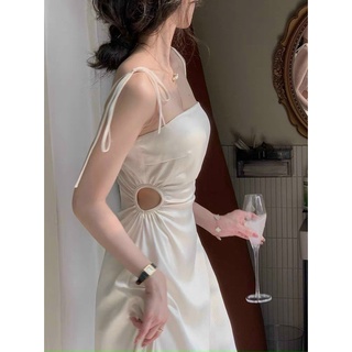 Đầm midi hai dây khoét eo