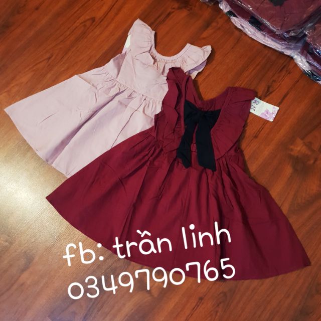 Váy buộc nơ bé gái qc
