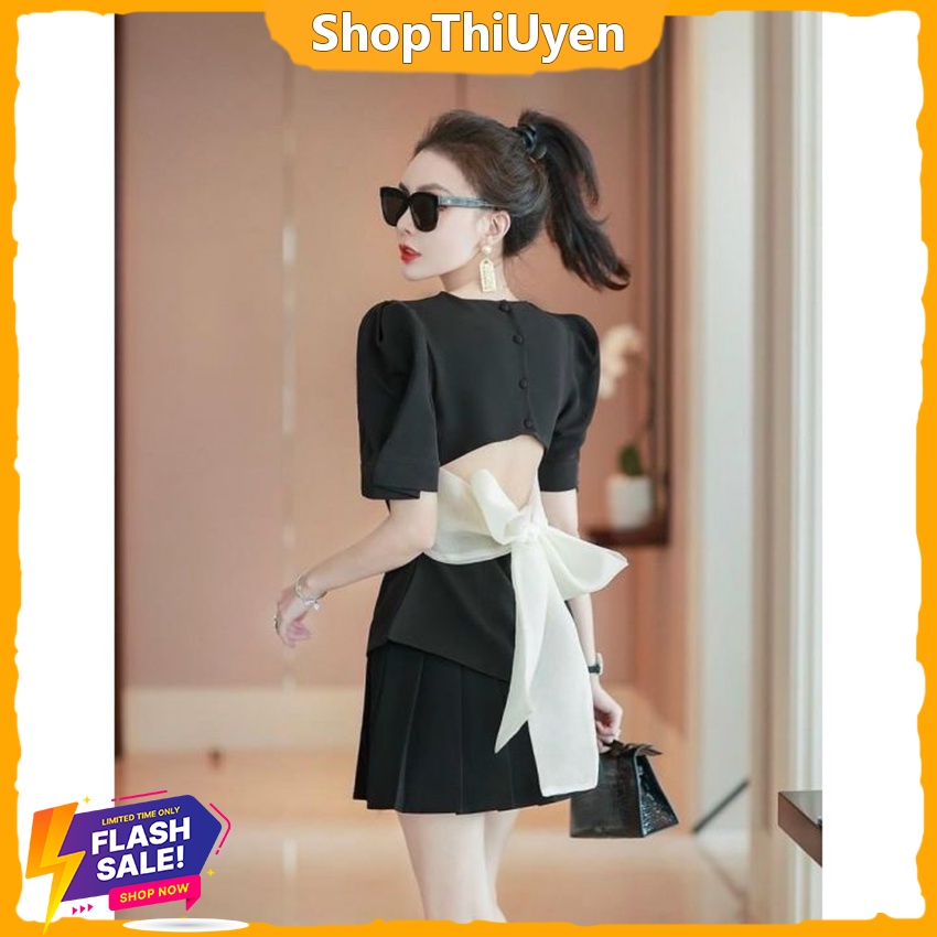 Đầm tuyết mưa nơ lớn trắng hở lưng cổ vuông tay ngắn form xòe xếp ly