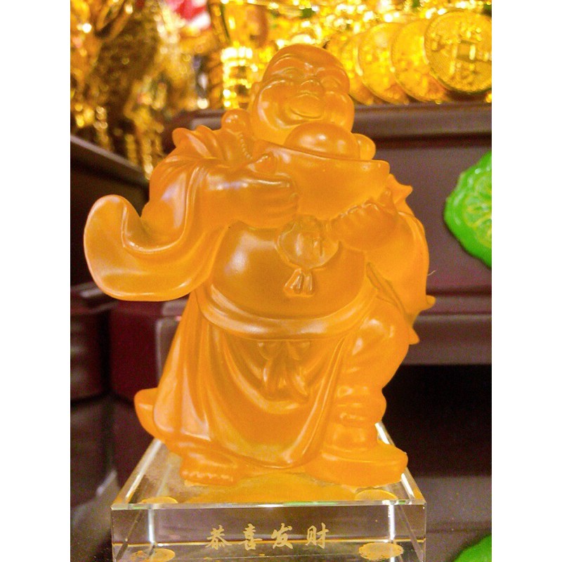 Tượng Phật Di Lặc lưu ly ôm thỏi vàng  .