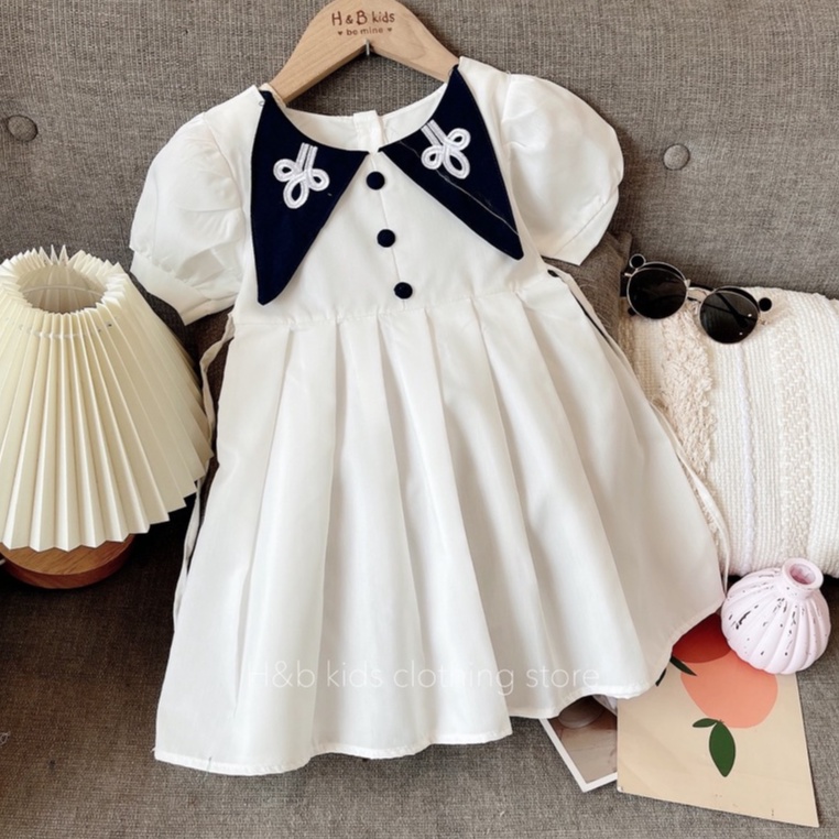 Váy Vạt Cổ Thêu  Xinh Xắn Thiết Kết Dập Ly  - Cúc Bọc Cổ Phong Cách Sang Chảnh Cho Bé Gái