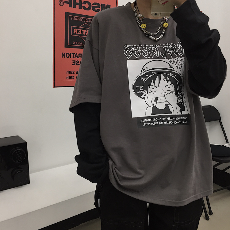 Áo thun tay dài dáng rộng in họa tiết hoạt hình cá tính | BigBuy360 - bigbuy360.vn